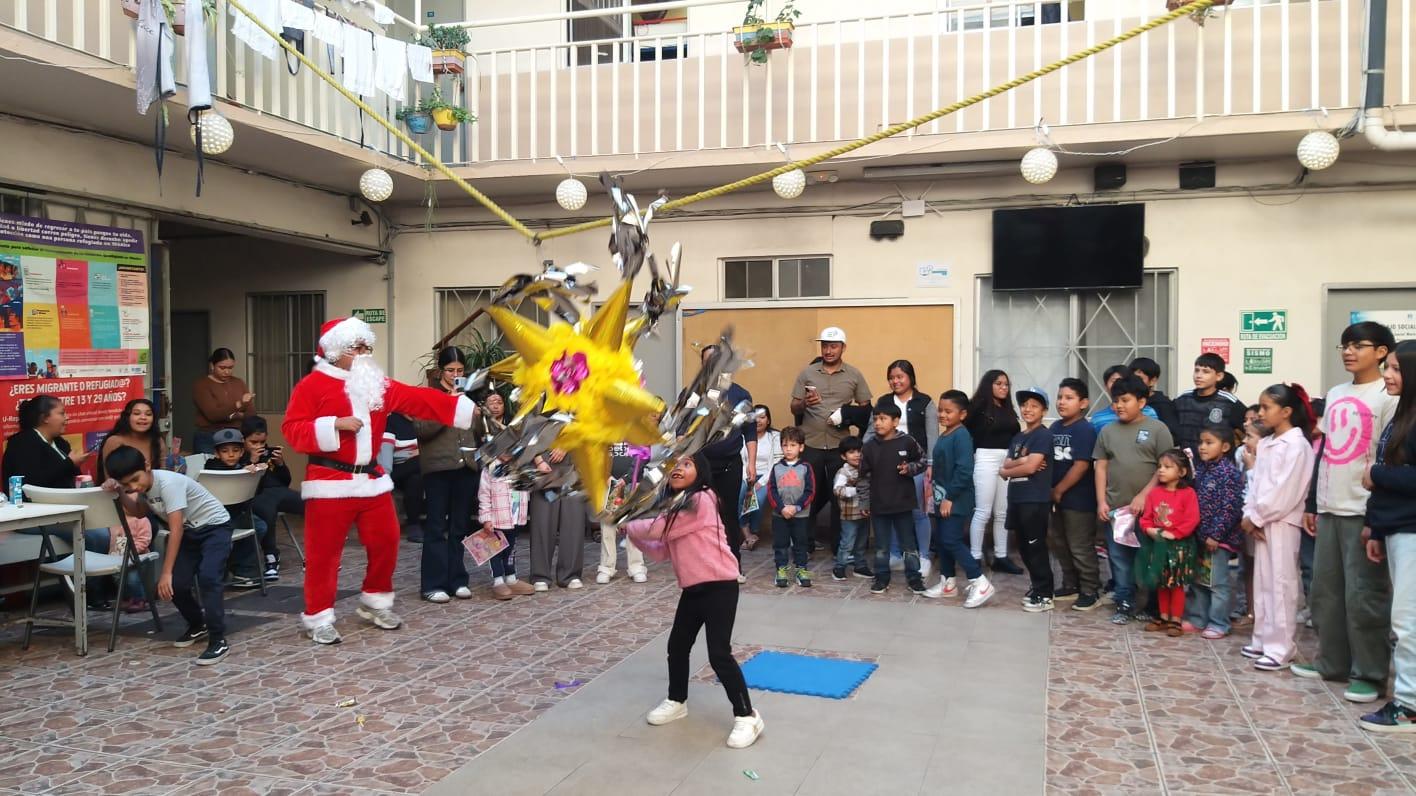 Realizan posada en albergue migrante con feria de la salud